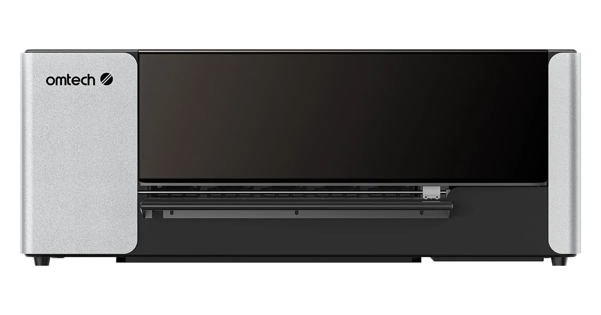 OMTech Aurora D1 roll-fed DTF printer with silver side panels and a dark tinted front cover